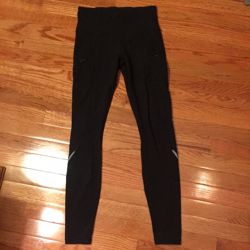 Black lulu lemon leggings with reflective stripes